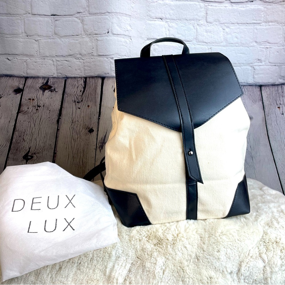 Deux Lux black and white canvas and vegan leather backpack